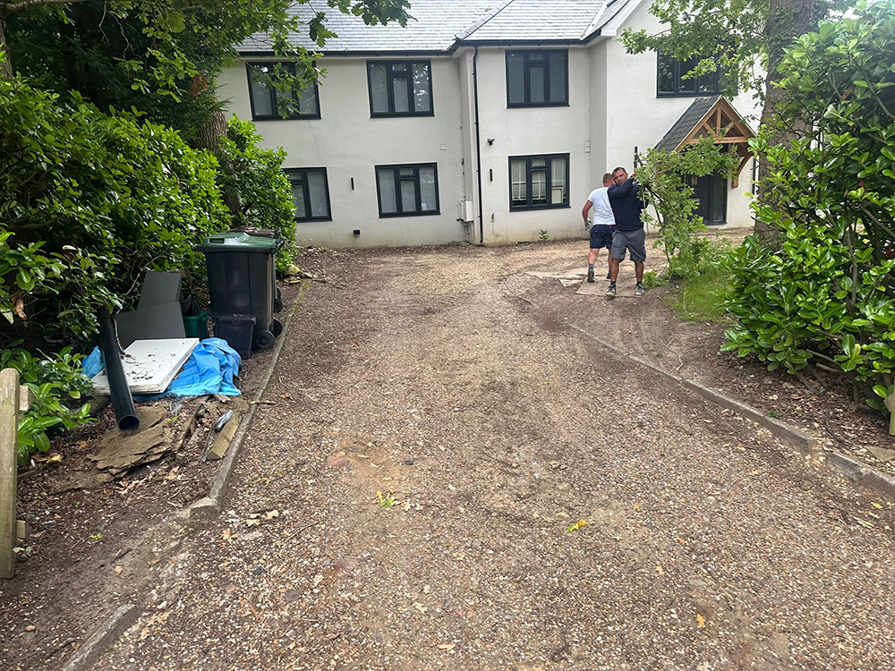 Before: Excavated driveway before paving